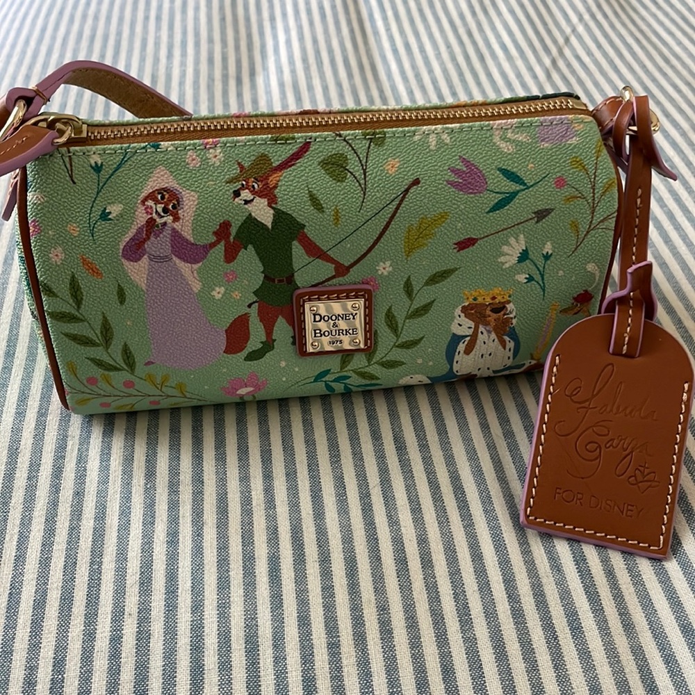 Disney Dooney and Bourke Robin Hood Mini Barrel Bag.